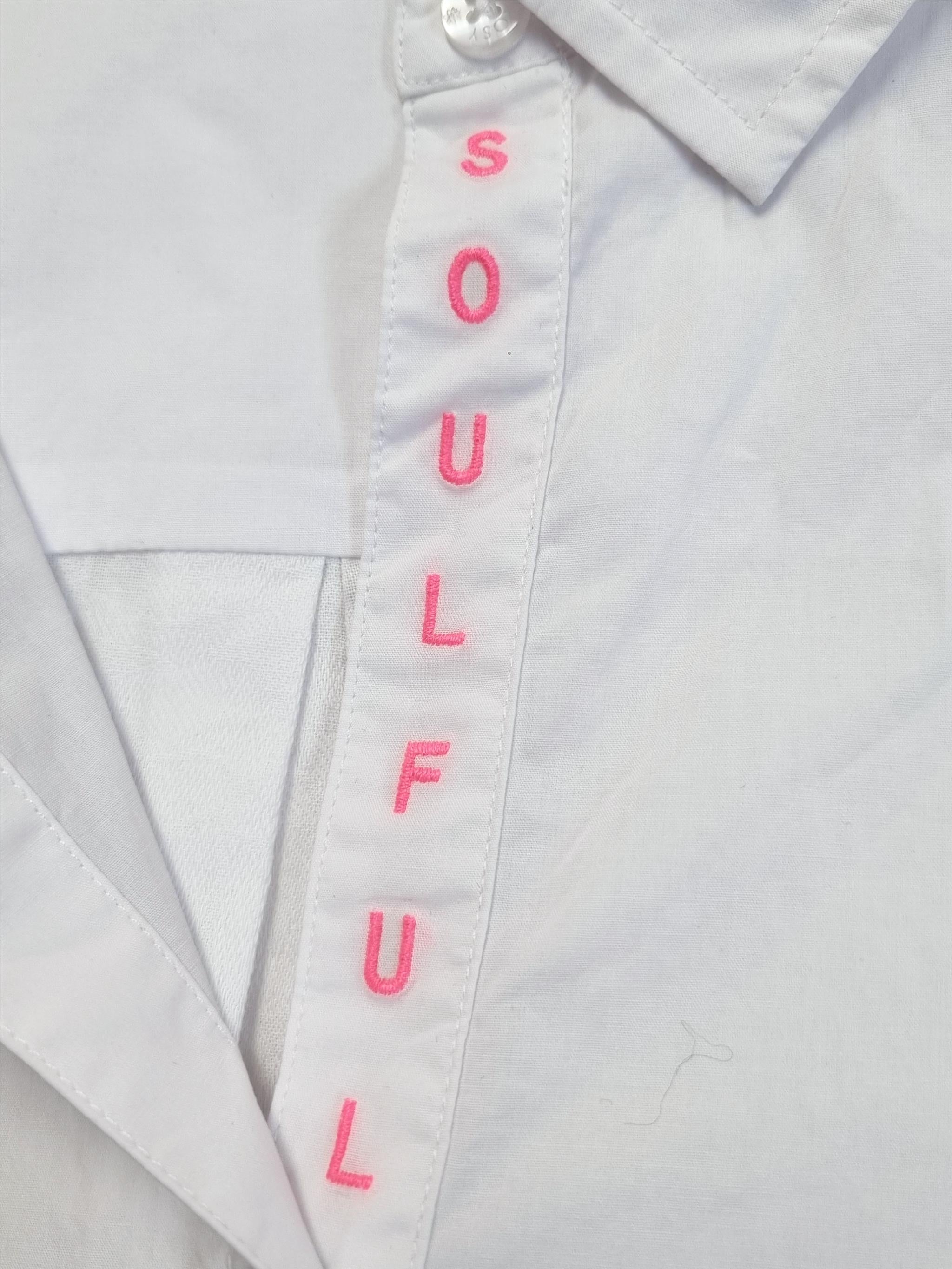 Blouse with jacquard back panel