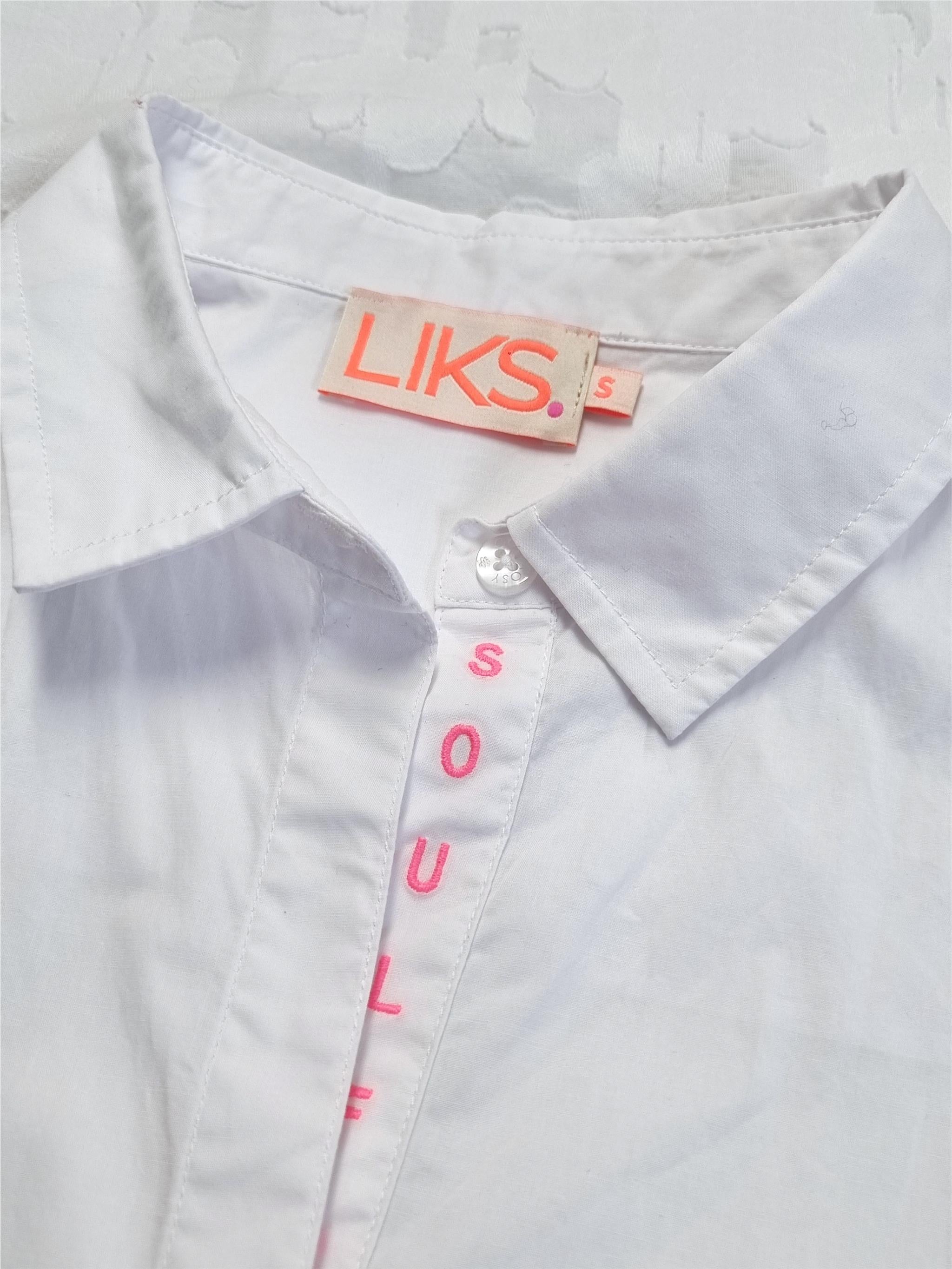 Blouse with jacquard back panel