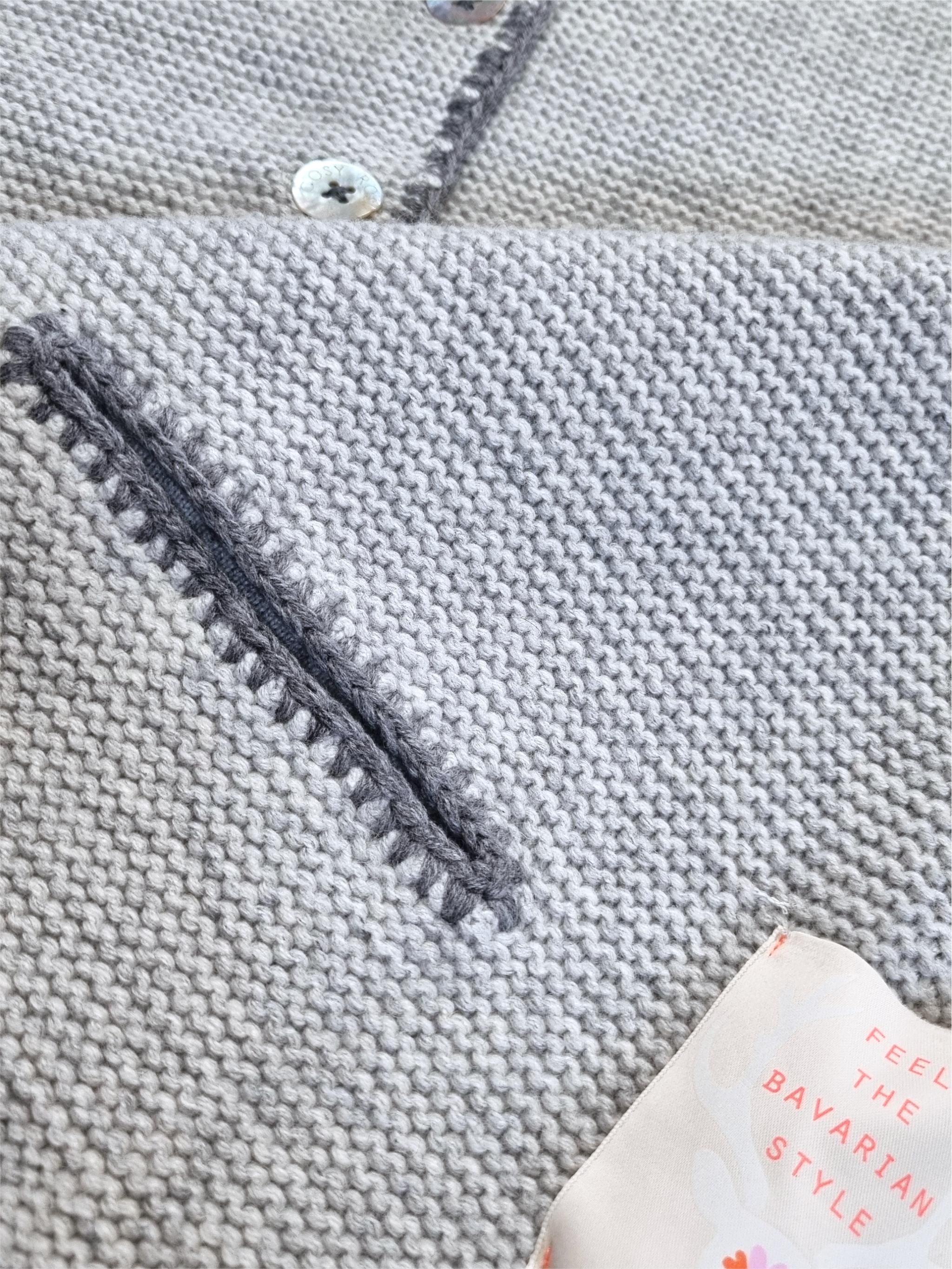 Knitted vest with hood and embroidery